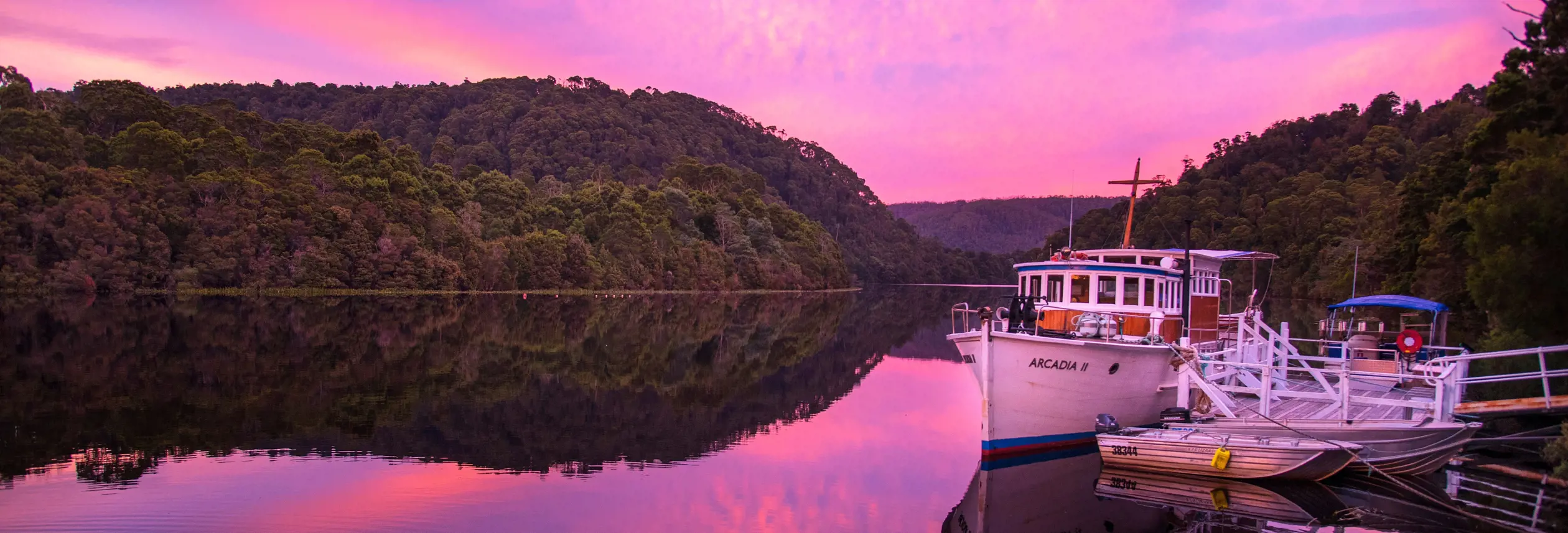 Arcadia II heritage cruise boat moored on the Pieman River at sunset, Corinna, takayna / Tarkine