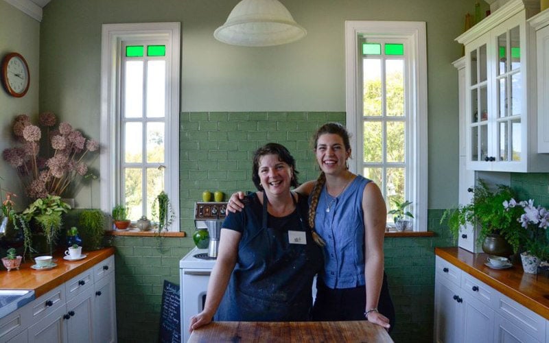Giuliana and daughter Genevieve pose for a photograph in their Farmhouse Kitchen